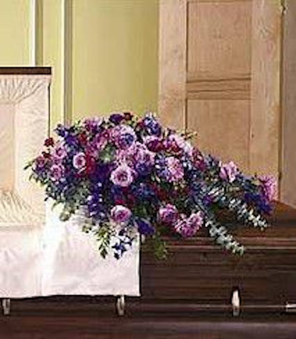 Sympathy Casket Spray in Shades of Purple Flint Florists Vogts Flowers