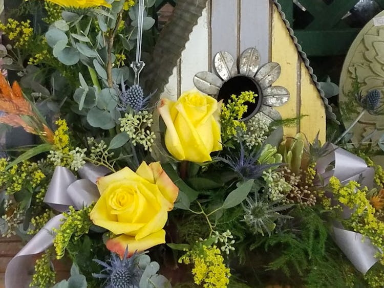 A lovely arrangement of yellow roses